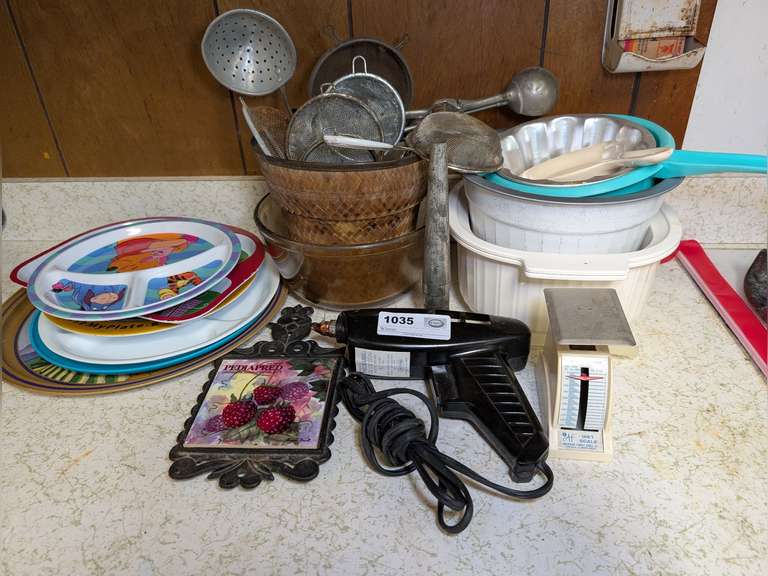 MIXING BOWLS, VINTAGE UTENSILS, GLUE GUN, VINTAGE AMERICAN FAMILY SCALE DIET SCALE, AND MORE IN COUNTERTOP AREA MARKED 1035 image