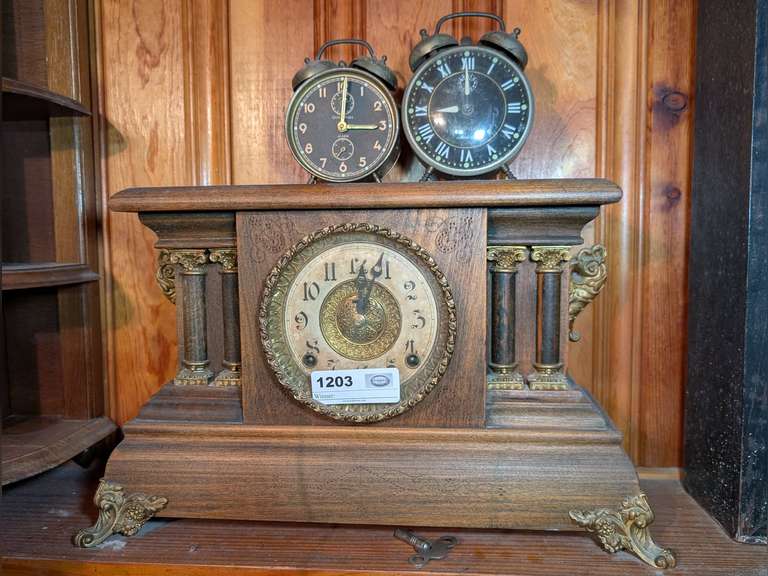 THREE VINTAGE AND ANTIQUE WIND UP CLOCKS image