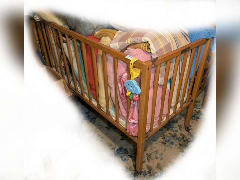 VINTAGE WOODEN BABY CRIB ON CASTERS image