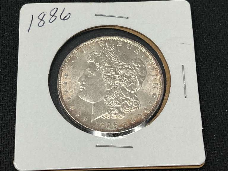 1886 Morgan silver dollar, see pictures for details. image