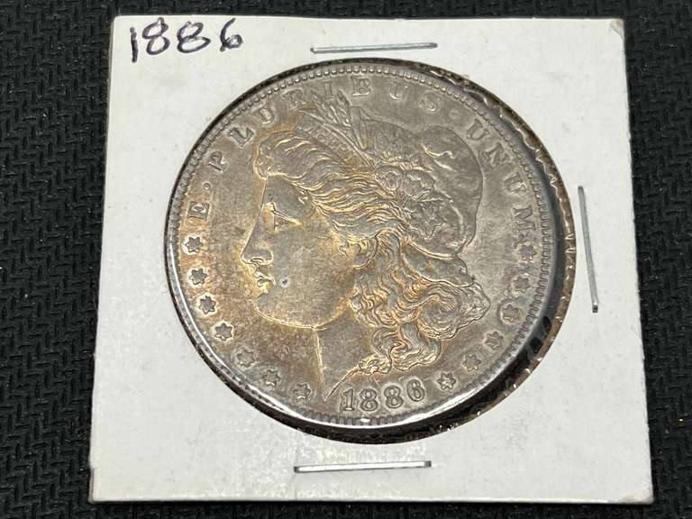 1886 Morgan silver dollar, see pictures for details. image