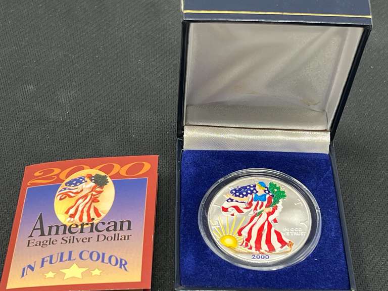 2000 American Eagle silver dollar, in color,  features 1 oz. fine silver, see pictures for details. image