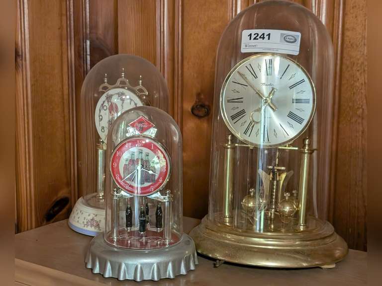 THREE DOME ANNUAL CLOCKS INCLUDING COCA-COLA, PRECIOUS MOMENTS, AND MASTER image