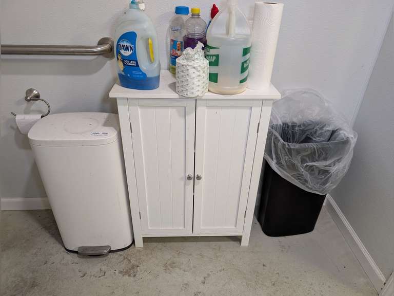 WHITE SWING DOOR CABINET, FLIP TOP GARBAGE CAN, AND STANDARD GARBAGE CAN image