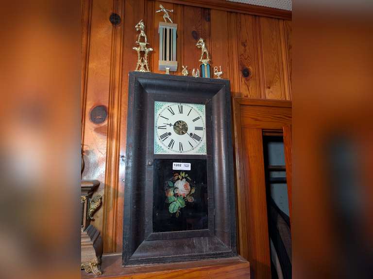 ANTIQUE DAVIS BROTHERS WINDUP CLOCK AND TROPHIES ON TOP image