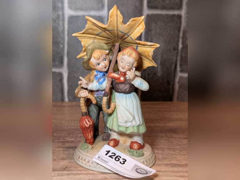 VINTAGE BISQUE PORCELAIN FIGURINE, BOY AND GIRL IN THE RAIN image