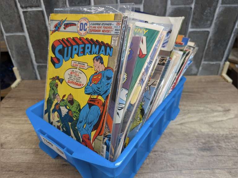 SMALL TUB FILLED WITH COMIC BOOKS image