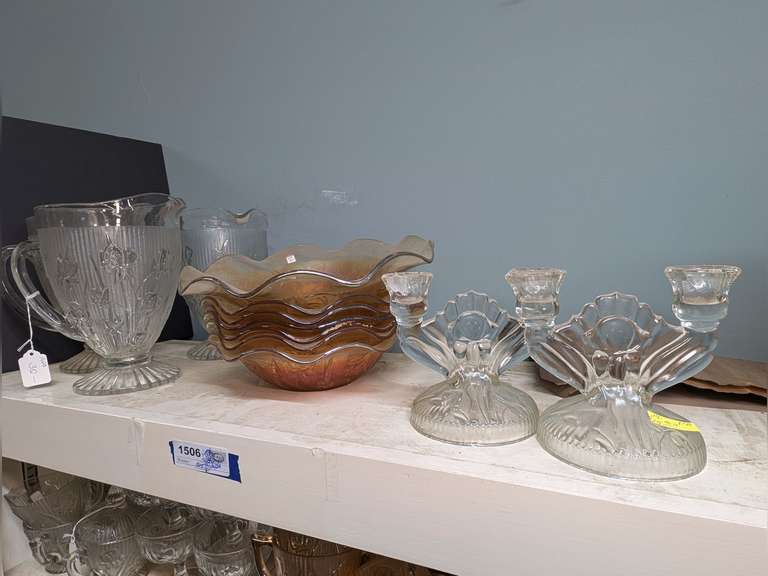 FORMAL GLASS PITCHERS, FRUIT BOWLS, AND CANDLESTICKS ON TOP OF CABINET MARKED 1506 image