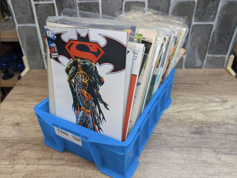 SMALL TUB FILLED WITH COMIC BOOKS image