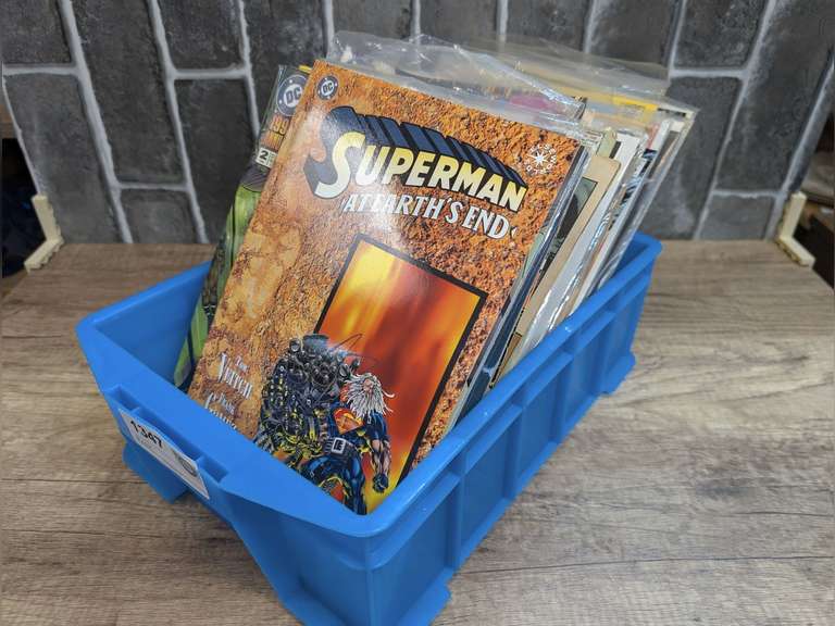 SMALL TUB FILLED WITH COMIC BOOKS image