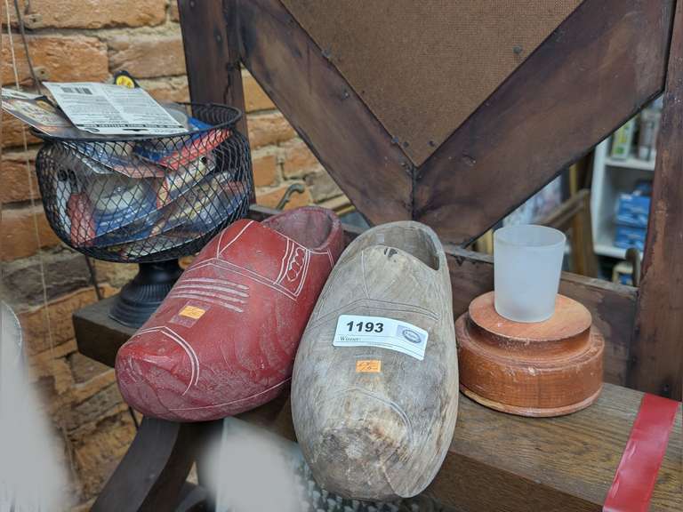 PAIR OF LARGE HAND CARVED DUTCH STYLE SHOES, OLD WIRE FRAME FOOTED BASKET, AND MORE IN UPPER SHELF AREA MARKED 1193 image