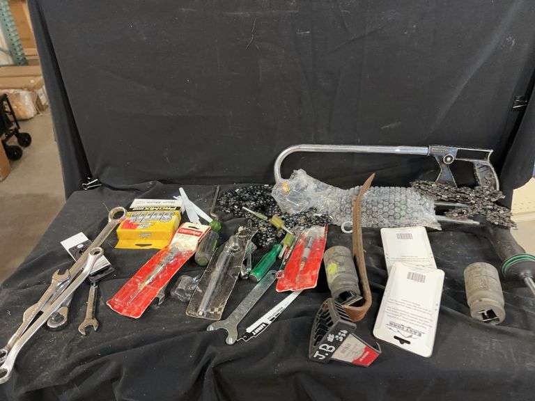Tools and Accessories Including Wrenches, Screwdrivers, and Fishing Lures