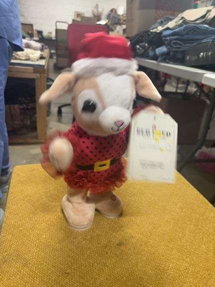 DANCING HAPPY GOAT WITH A SANTA HAT.  NEW FROM TRACTOR SUPPLY image