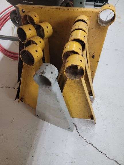 Multiple Metal Pipe Stands with Gray Metal Component image