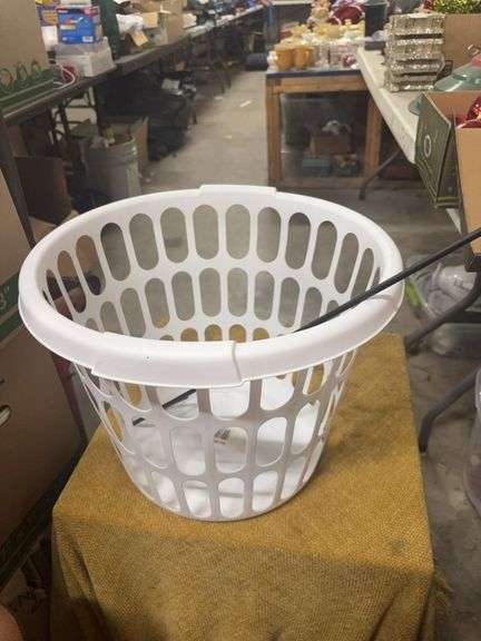 LAUNDRY BASKET AND A SMALL YARD HOOK image