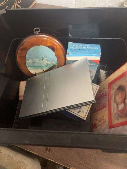 MISC PIECES IN A BLACK STORAGE TOTE image