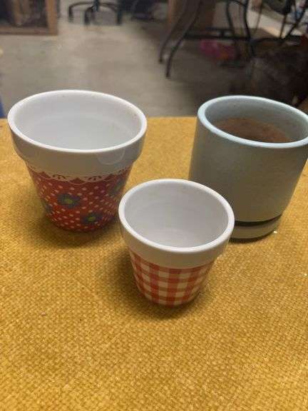 THREE SMALL FLOWER POTS image