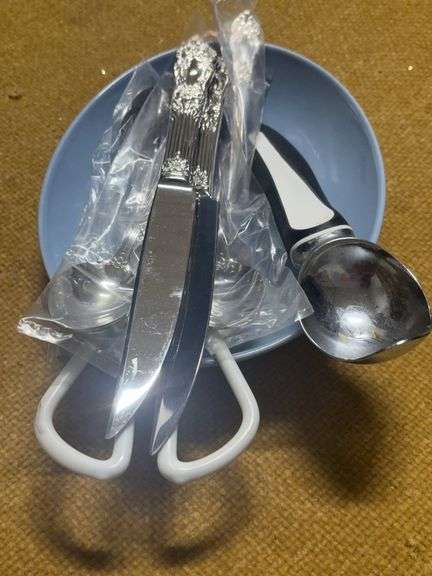 BLUE DISH AND SILVERWARE image