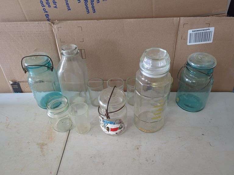 Assorted Glassware: Jars, Drinking Glasses, and Milk Bottle
