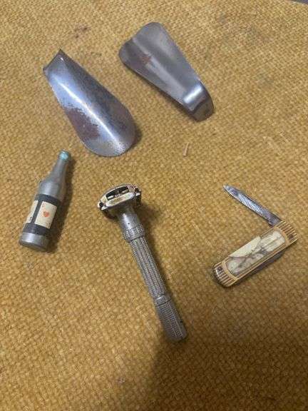 TWO SHOE HORNS, OLD SMALL KNIFE, METAL RAZOR, AND LITTLE BOTTLE image