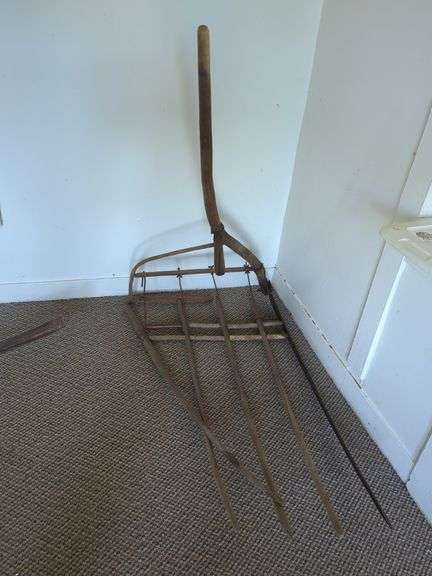 Wooden Cradle and Grass Scythe