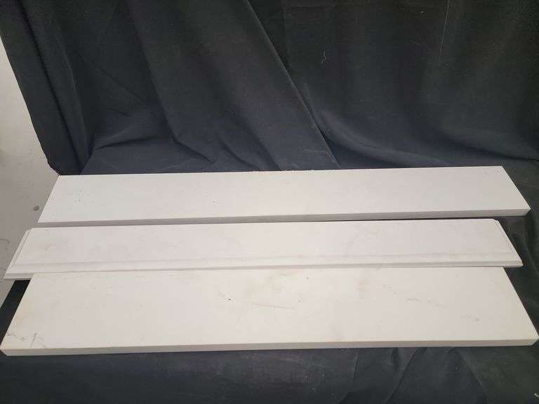 Three White Decorative Trim Pieces image