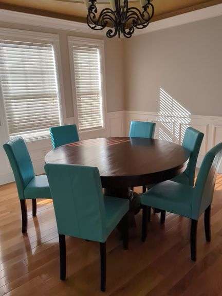 Round Table with Six Teal Chairs image