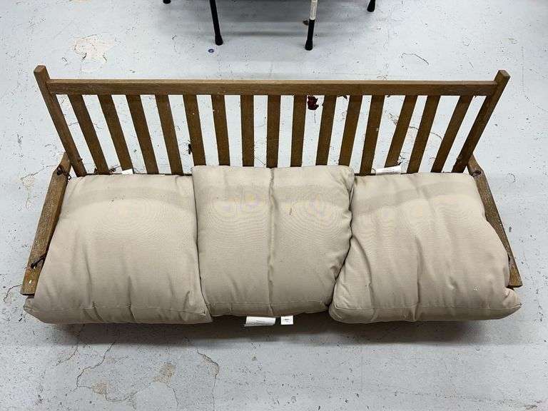 Wooden Porch Swing with Chains and Cushions image