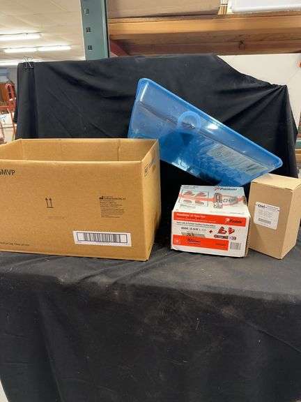 Viking 6/12V Battery Charger, Paslode Nails, and CNH Hydraulic Filter Assortment image