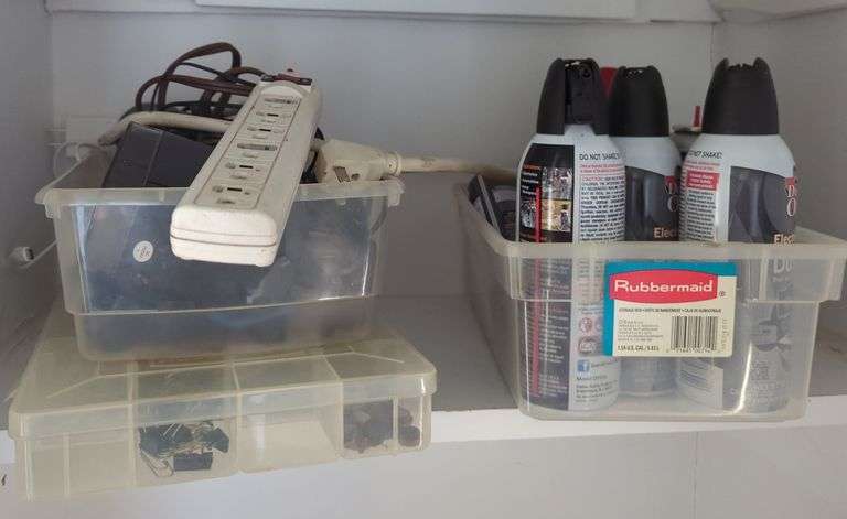 Shelf With Power Strip, Spray Cans, and Hardware image