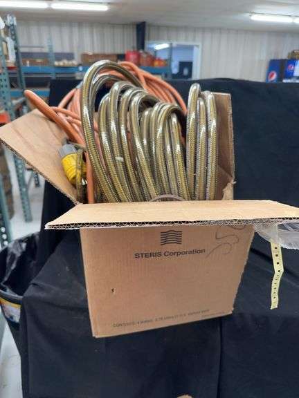 Assorted Hoses and Electrical Cords image