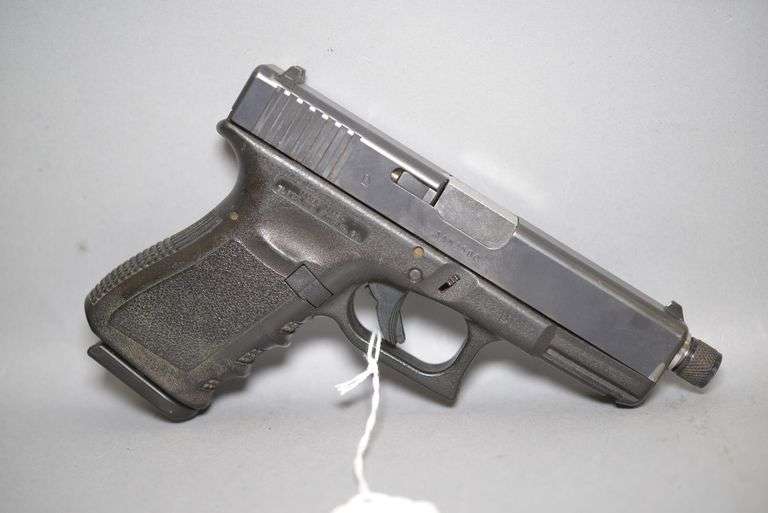 Glock Model 23 Pistol With Aftermarket 9MM Threaded conversion barrel, image