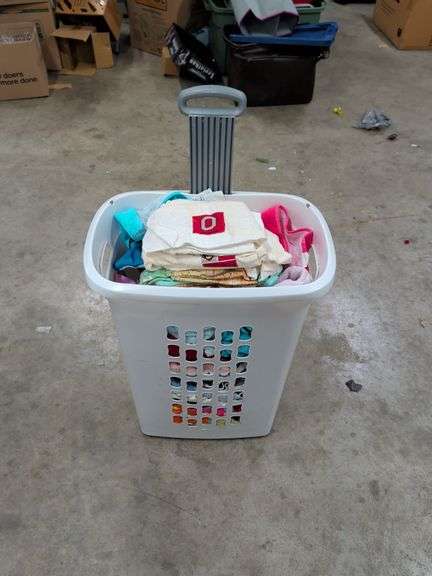 LAUNDRY BASKET OF TOWELS AND WASH CLOTHS image