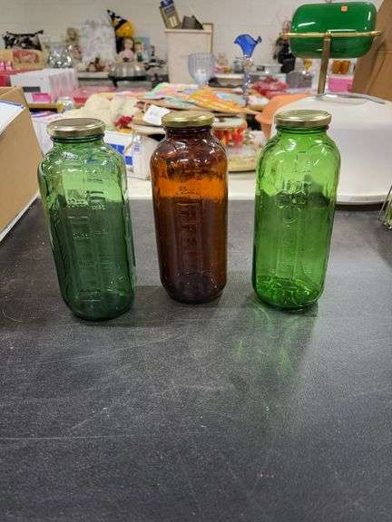 3- 32oz.- JUICE BOTTLES- 2 GREEN 1- AMBER IN COLOR image