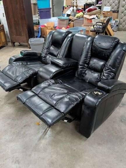 ELECTRIC RECLINING LOVESEAT WITH ADJUSTABLE HEADREST CUP HOLDERS AND CENTER STORAGE DOES HAVE SOME CRACKING AND PEELING IN FABRIC 74 INCHES WIDE image