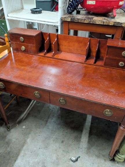 BOMBAY 2 DRAWER TABLE WITH TOP SHELF HAS CHIP ON CORNER 48X24X31 image