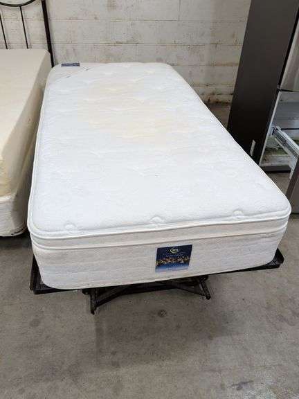 TWIN SIZE TRUNDLE BED WITH SERTA MATTRESS - FRAME WILL FOLD UP TO SLIDE UNDER ANOTHER BED - MATTRESS WILL BE GIVEN TO BUYER IF WANTED image