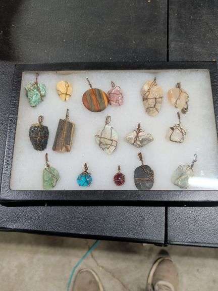 GEM STONES IN DISPLAY CASE image