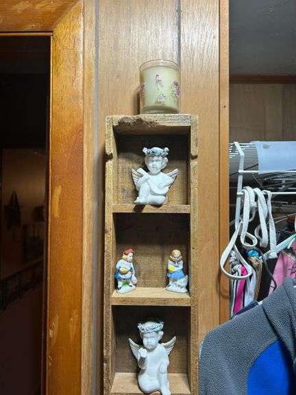 Collectible Figurines in Wooden Display Case