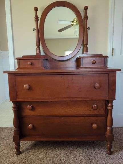 Wood Dresser with Oval Mirror and Small Drawers image