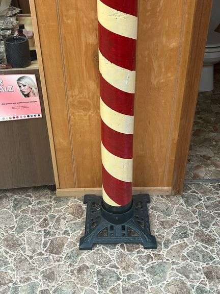 Decorative Barber Pole with 'Haircut & Shave' Signage