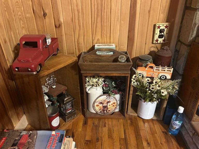 Rustic Home Decor Assortment with Toy Trucks, Floral Accents, and Candles