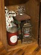 Rustic Home Decor Assortment with Toy Trucks, Floral Accents, and Candles