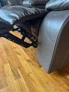 Brown Leather Reclining Loveseat with Center Console
