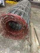 Roll of Fencing Wire with Post Driver