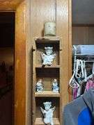 Collectible Figurines in Wooden Display Case