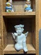 Collectible Figurines in Wooden Display Case