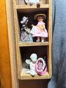 Collectible Figurines in Wooden Display Case
