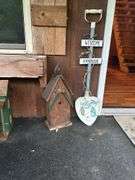 Decorative Birdhouses and Welcome Sign
