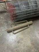 Roll of Fencing Wire with Post Driver